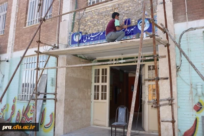 نصب عکس شهید قاسم سلیمانی در پردیس حضرت رسول اکرم(ص) خوزستان